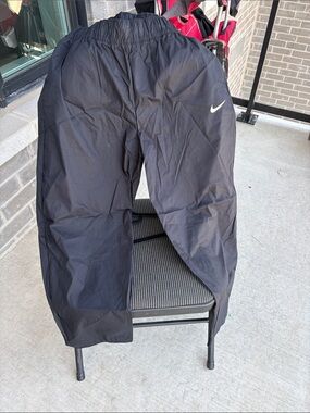 Nike Black Track Pants with White Swoosh Logo